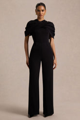 Raquel | Black Asymmetric-Neck Jumpsuit With Twisted Cape Detail