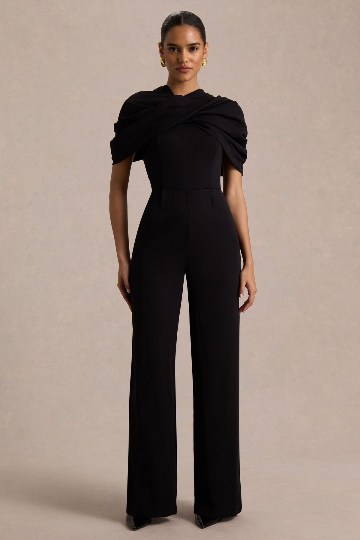 Raquel | Black Asymmetric-Neck Jumpsuit With Twisted Cape Detail