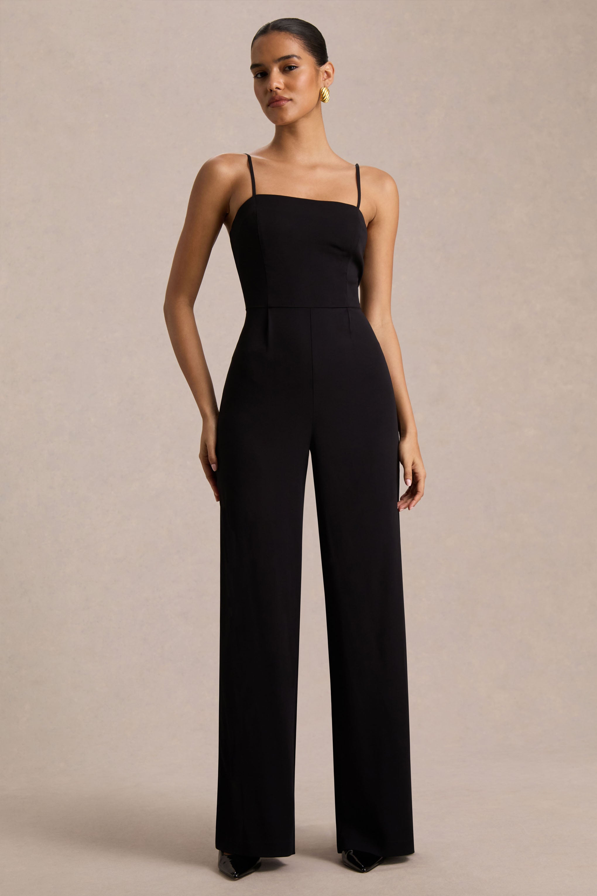 Raquel | Black Asymmetric-Neck Jumpsuit With Twisted Cape Detail