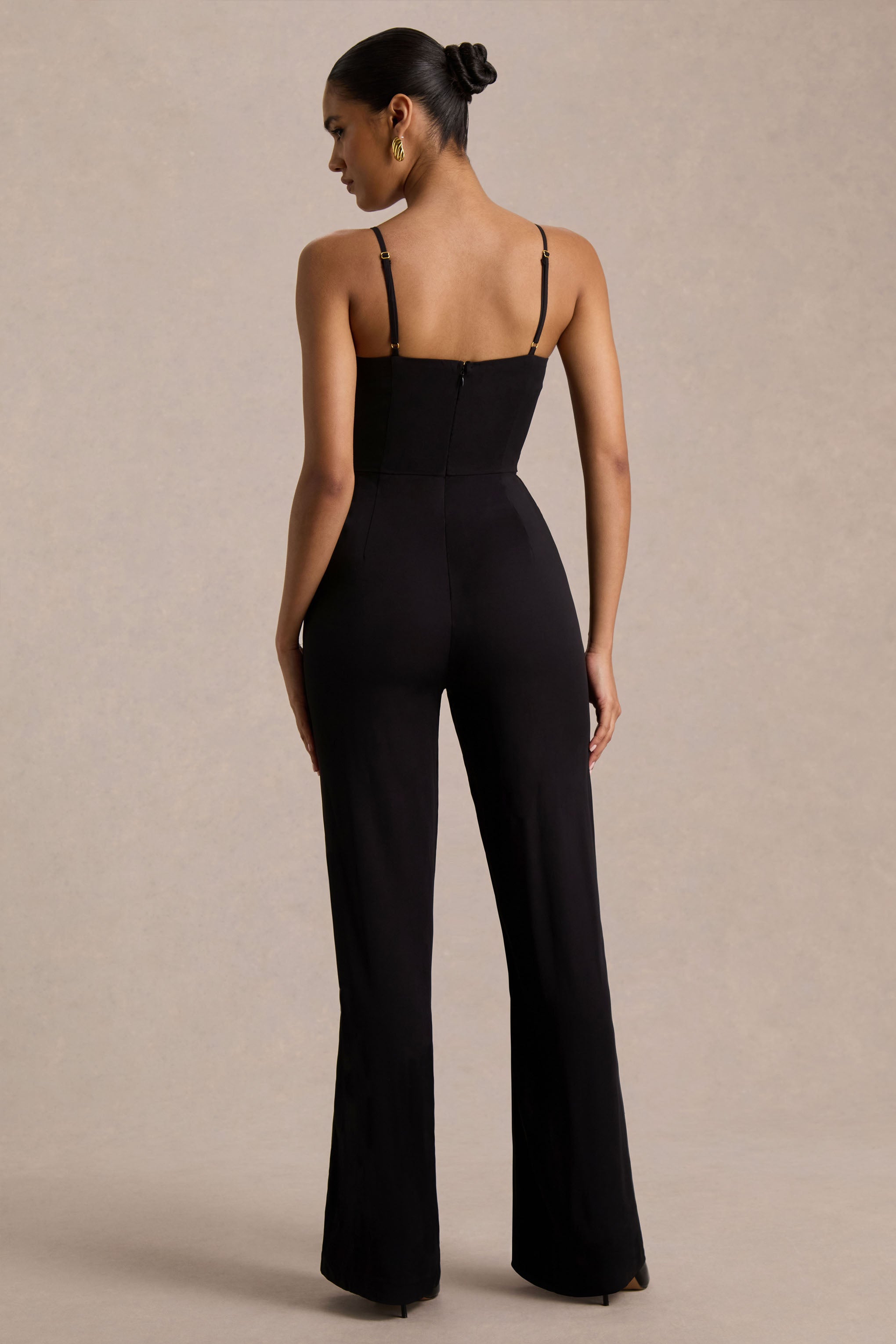 Raquel | Black Asymmetric-Neck Jumpsuit With Twisted Cape Detail