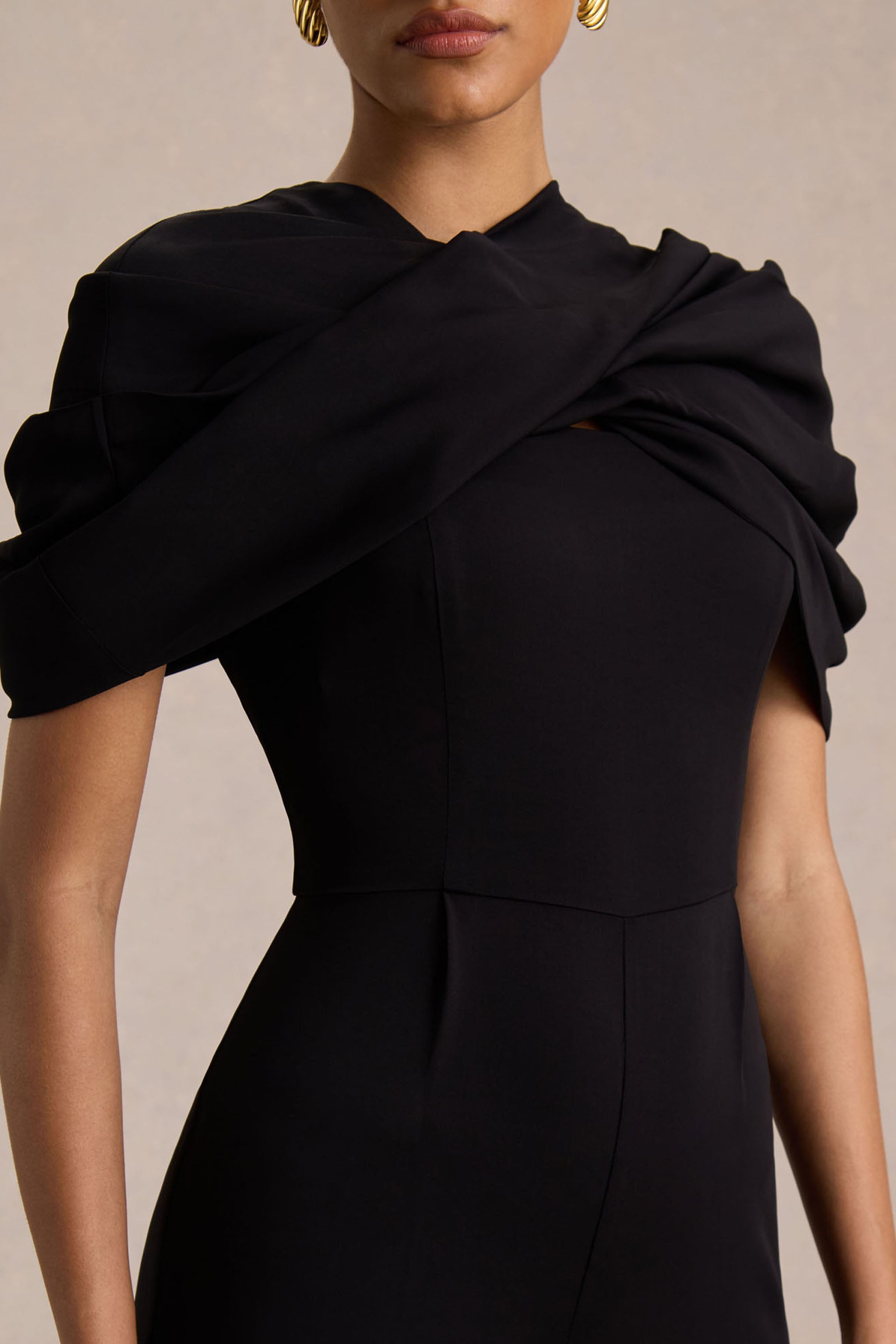 Raquel | Black Asymmetric-Neck Jumpsuit With Twisted Cape Detail