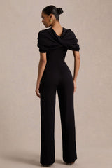 Raquel | Black Asymmetric-Neck Jumpsuit With Twisted Cape Detail
