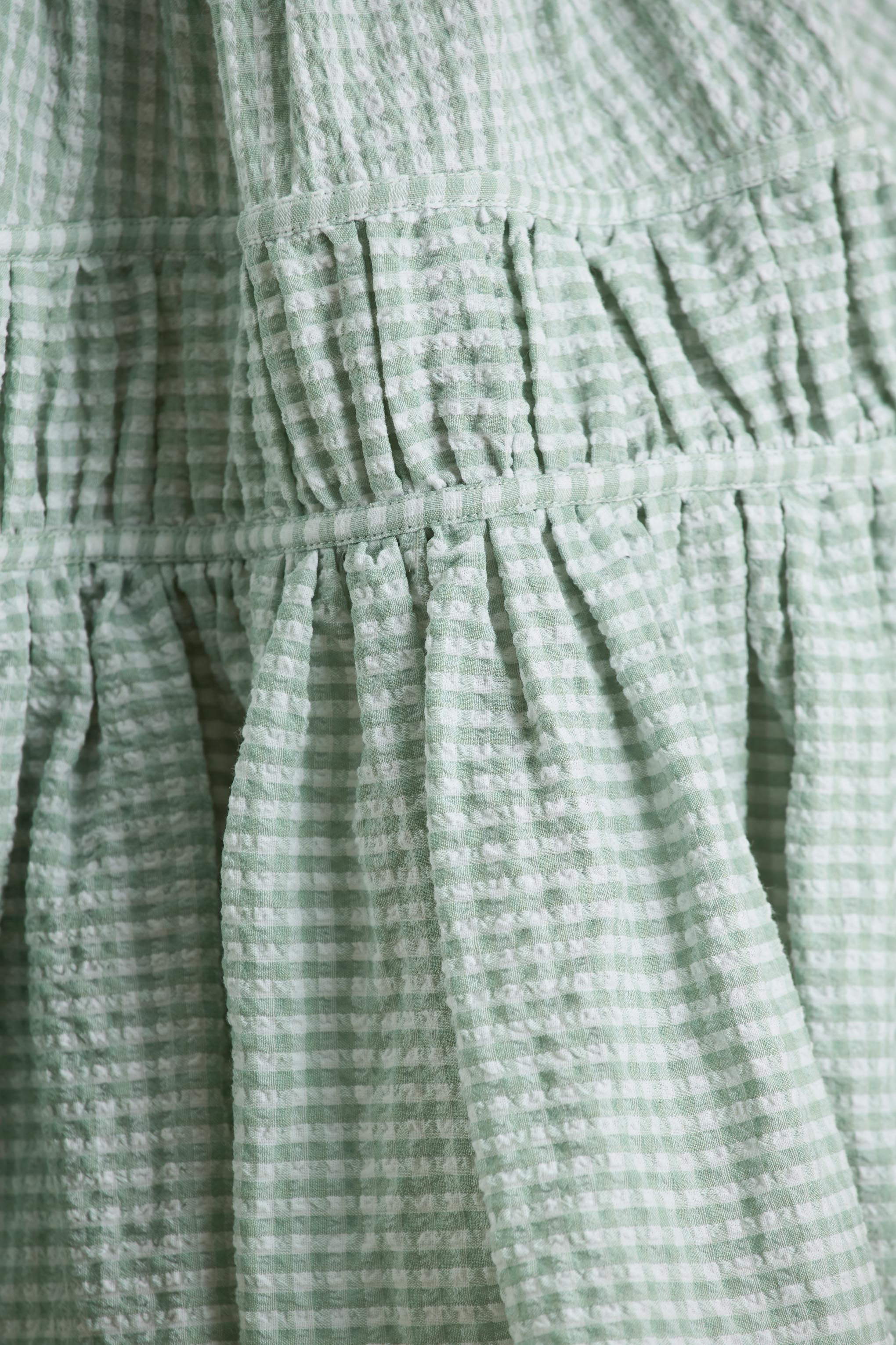 Laurelle | Green Extreme Plunge-Neck Mini Dress With Ruffling Detail