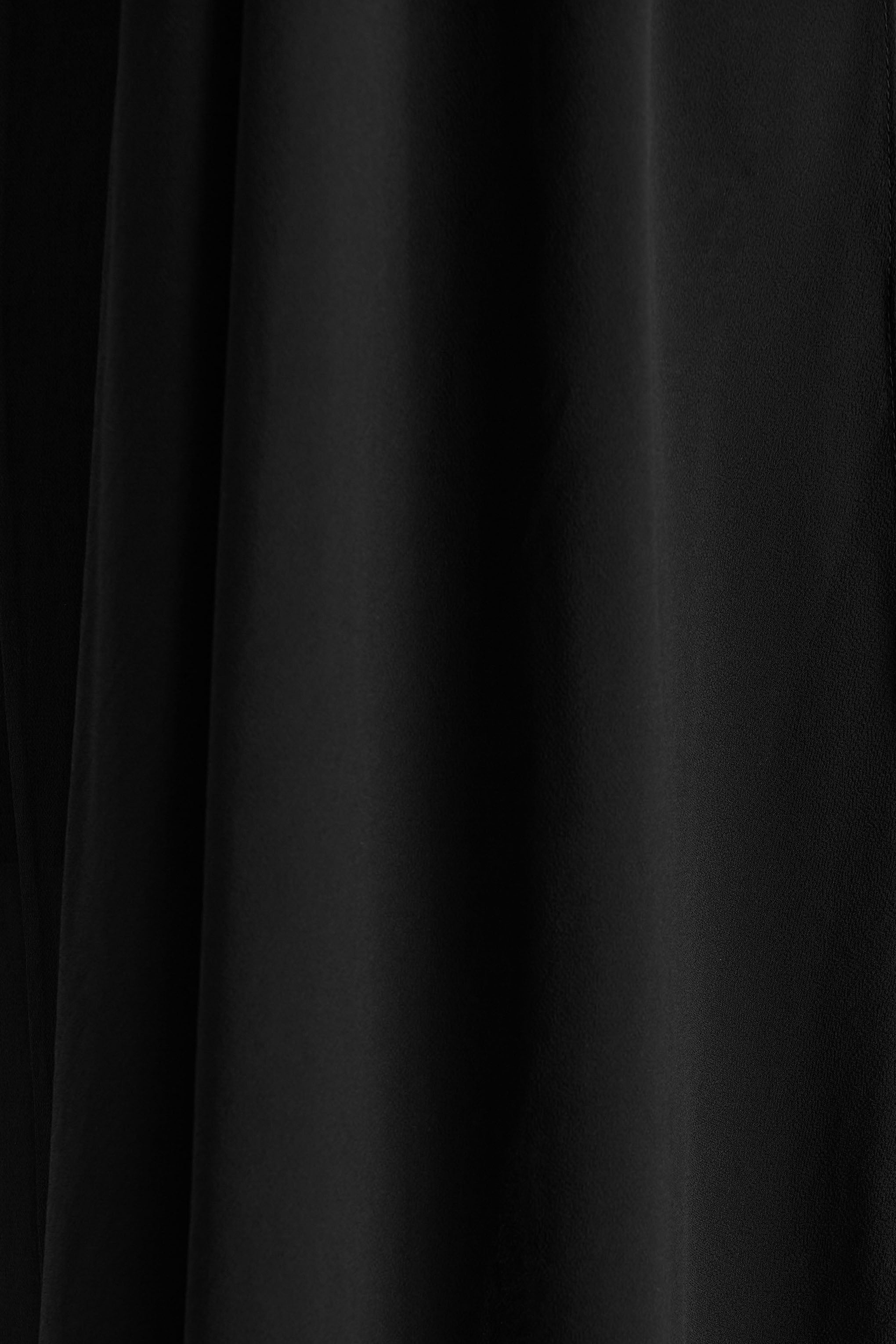 Unpredictable | Black High-Neck Maxi Dress With Back Cape Detail